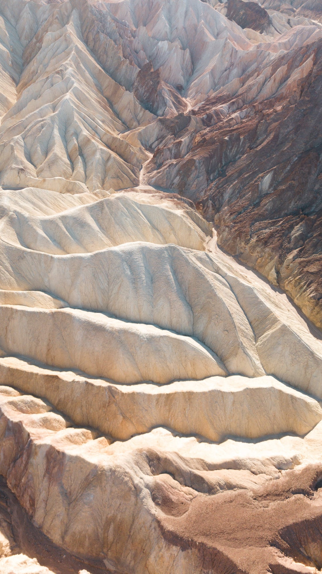 Aerial view of layered sandstone mountain ridges